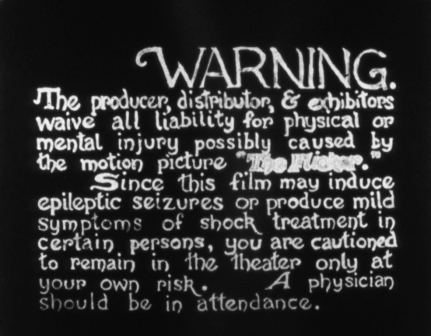 Still of the initial "Warning"  in Tony Conrad's The Flicker (1966)